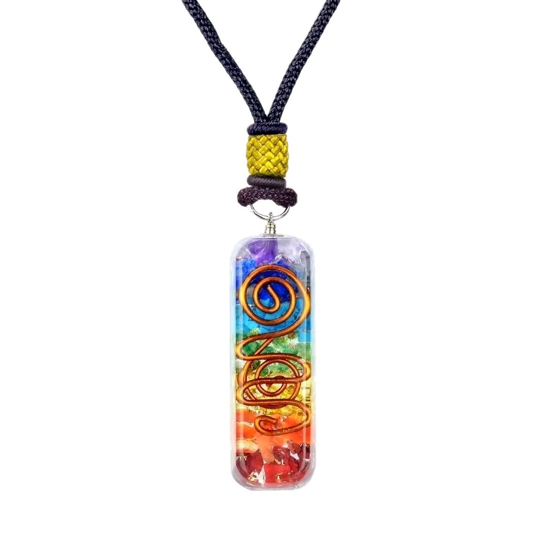 7 Chakra Reiki Stone orgone pendant with fused crystals for meditation and healing.