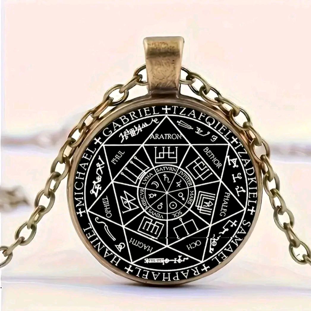 Serenity Angel Necklace with intricate angelic symbols pendant on a stainless steel chain