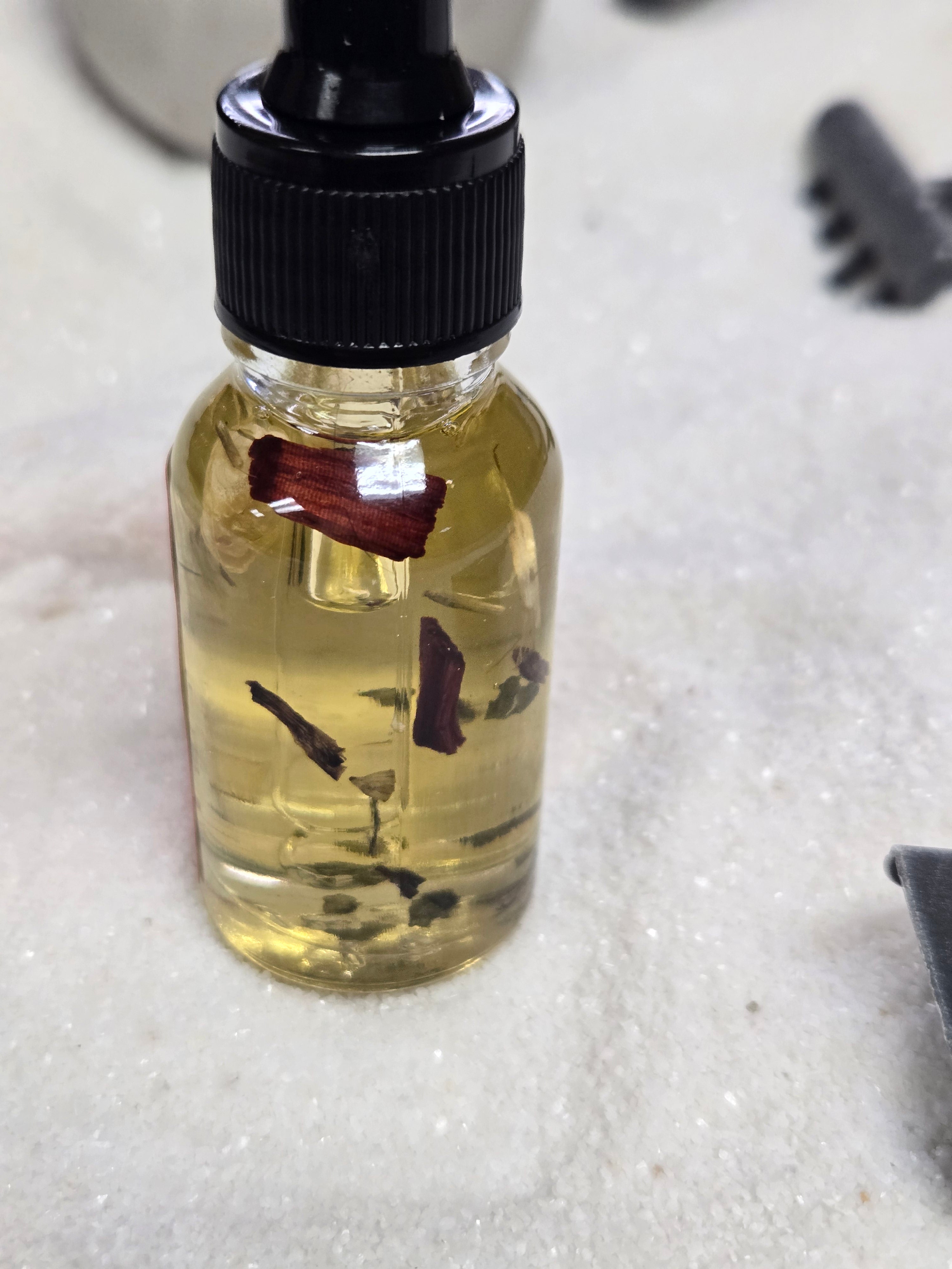 Divination oil with sacred herbs for psychic developmen