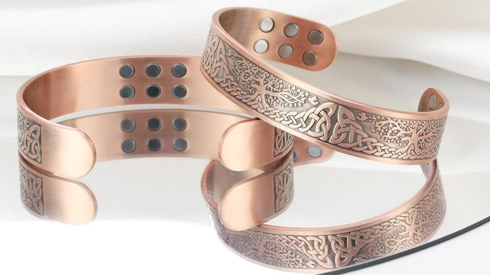 Magnetic cuff bangle with Tree of Life design and adjustable copper bracelet.