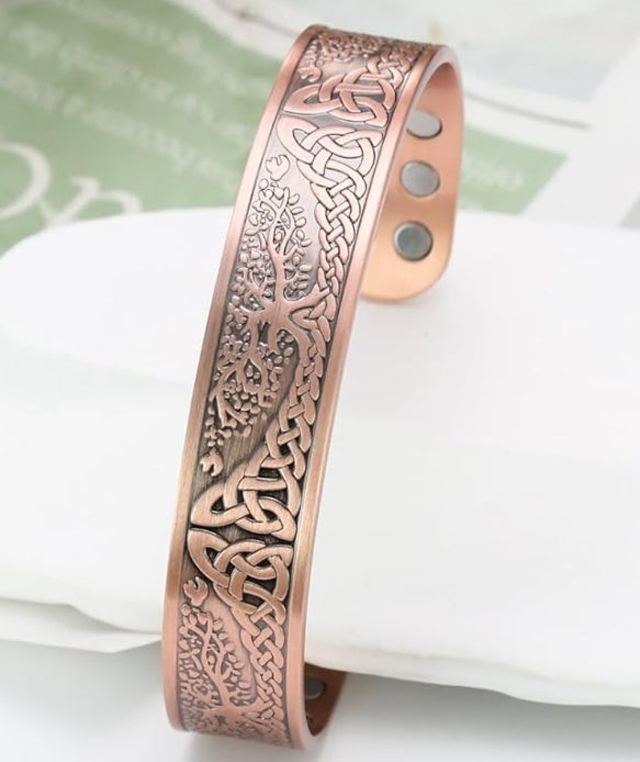 Magnetic cuff bangle with Tree of Life design, made from copper, featuring 3500 Gauss neodymium magnets.