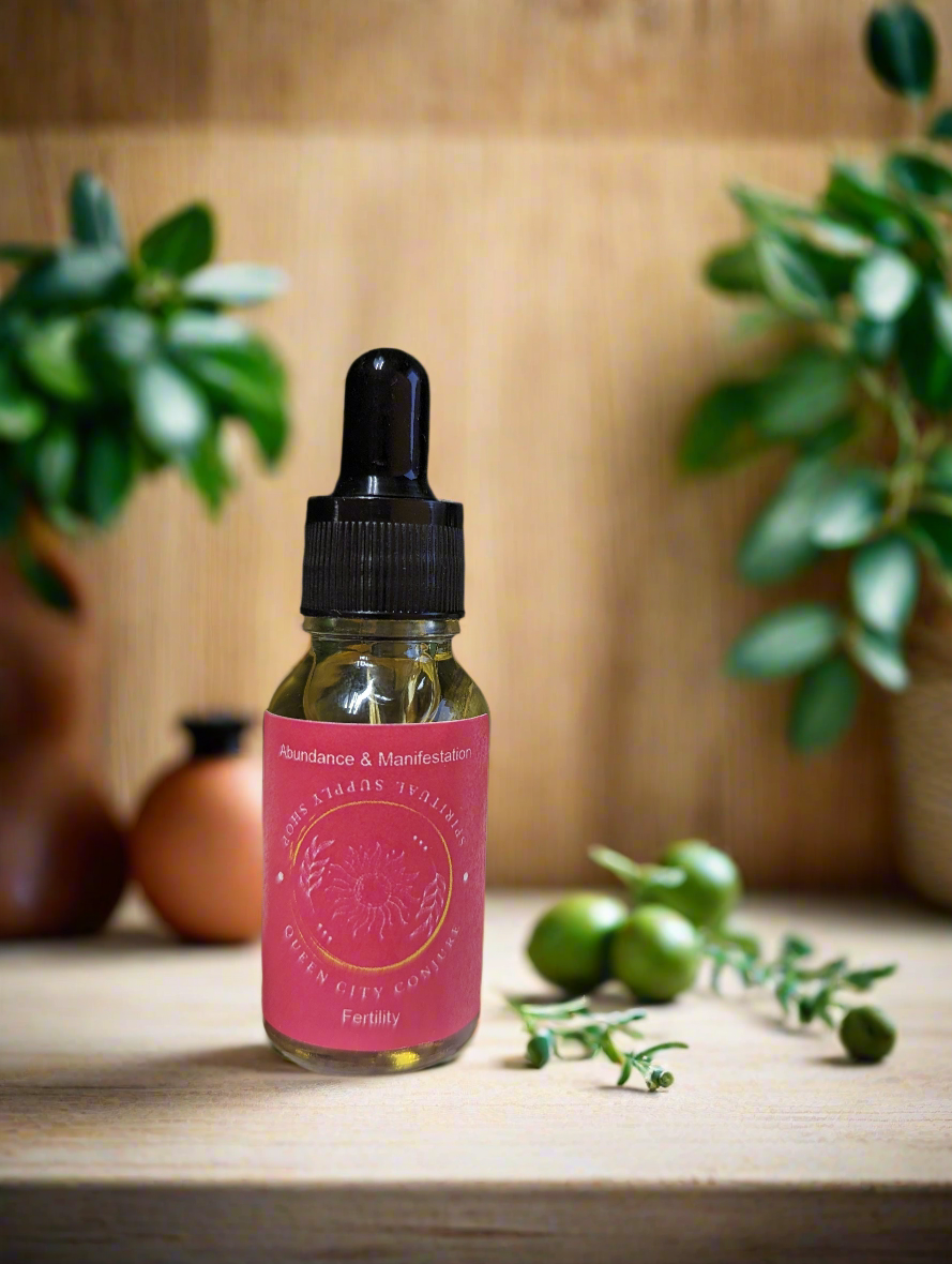 Fertility Conjure Oil bottle with dropper and plants in the background.