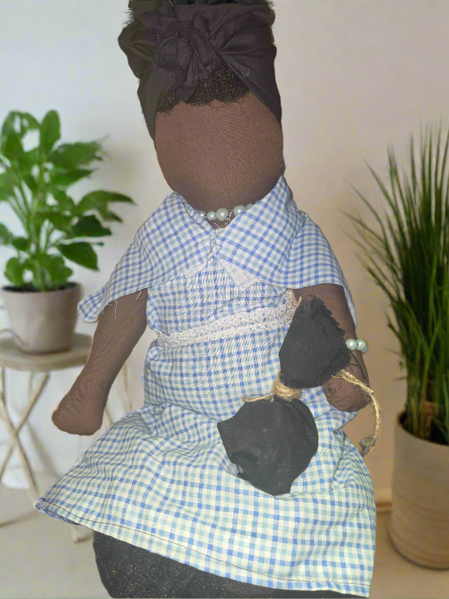 Big Mama ancestor doll representing someone who needs support, focusing on their well-being.