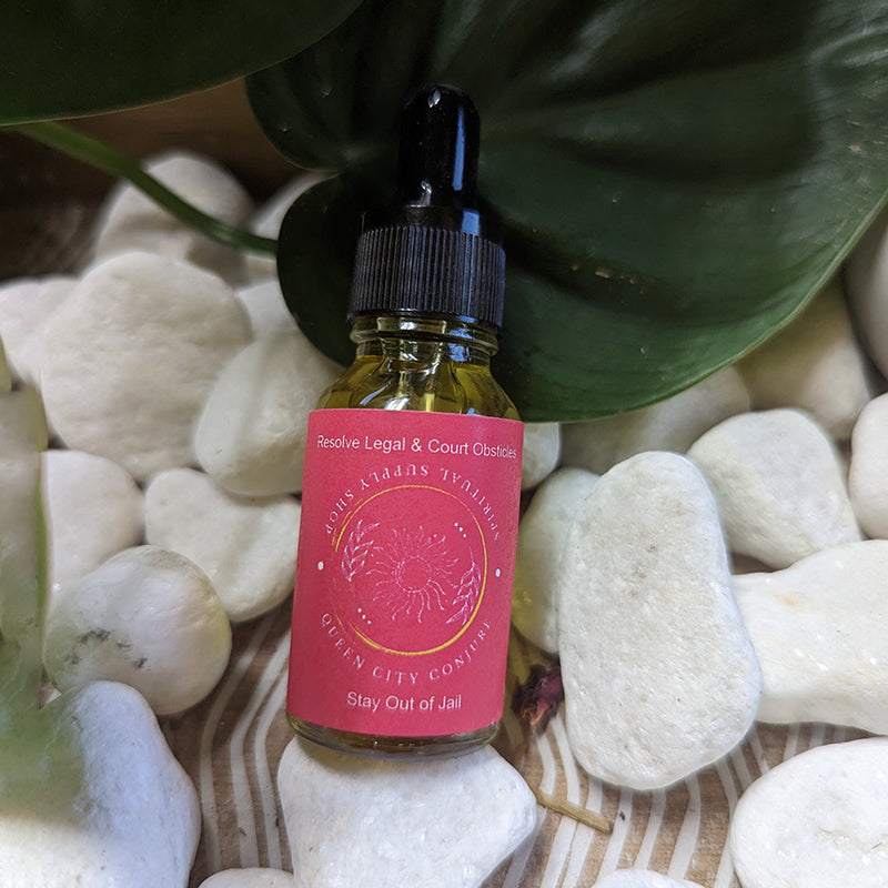 Stay Out of Jail conjure oil bottle for legal protection and peace of mind.