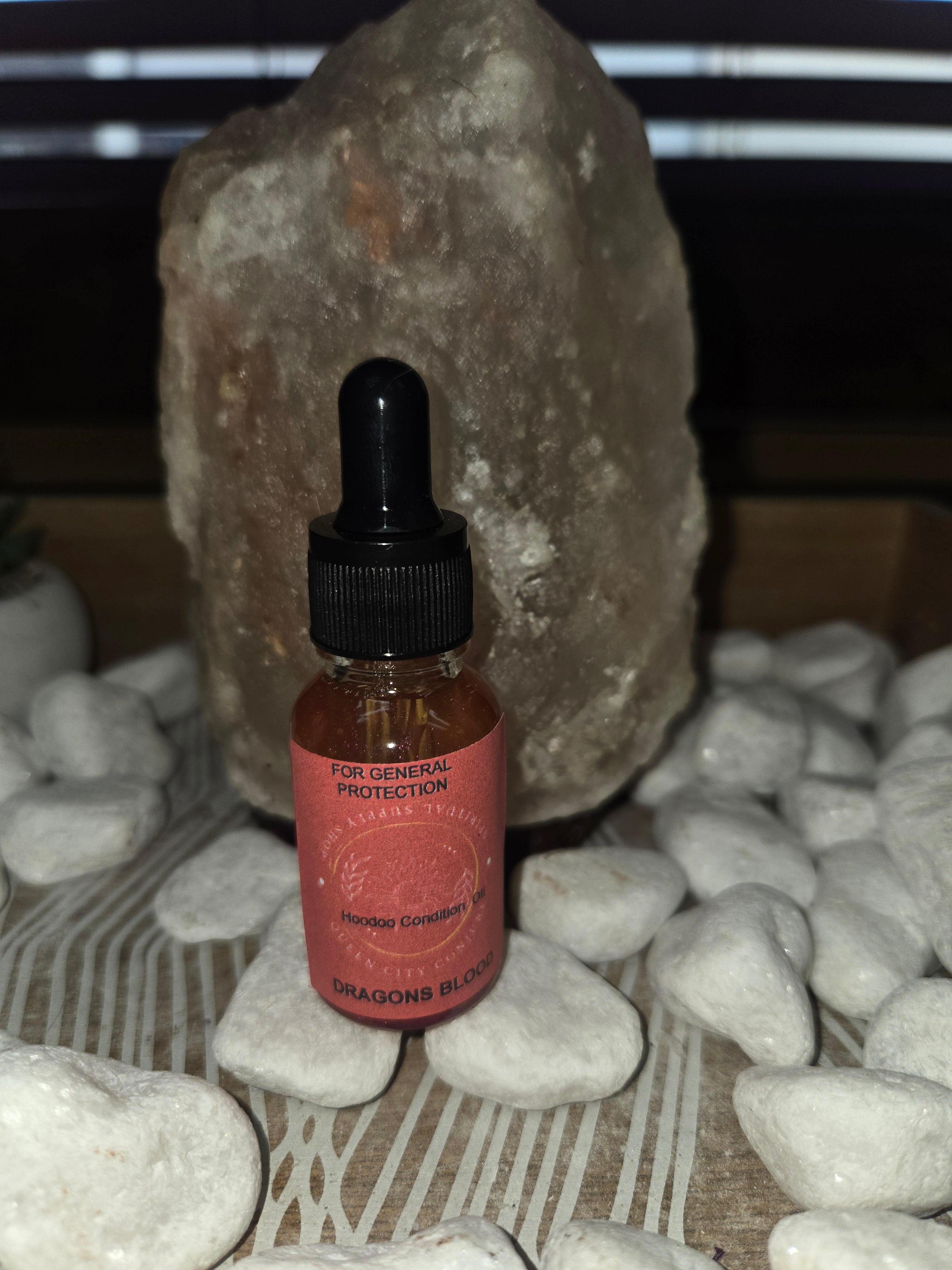 Dragon blood protection oil bottle, spiritual protection, natural herbs and resin.