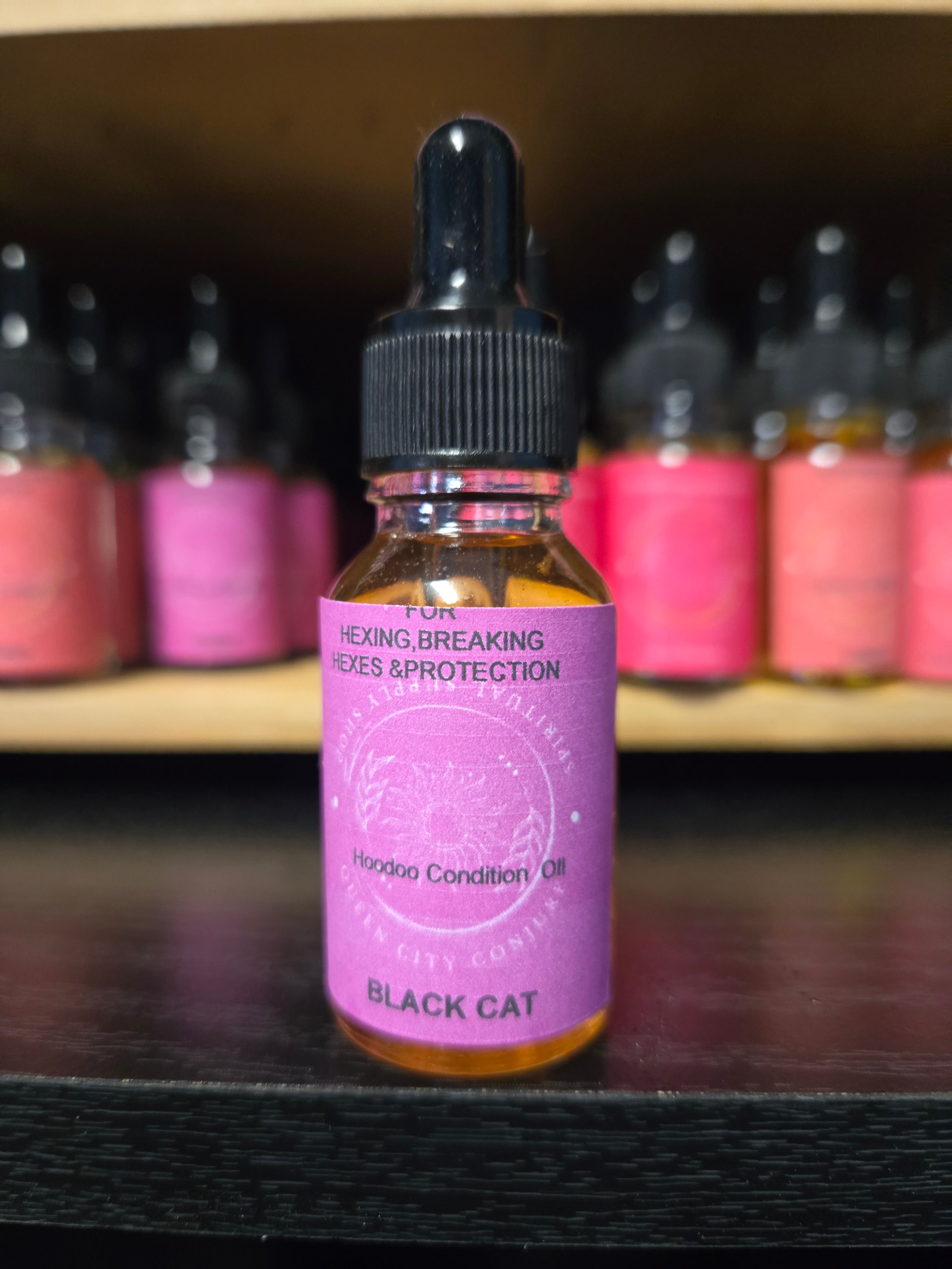 black cat spiritual oil