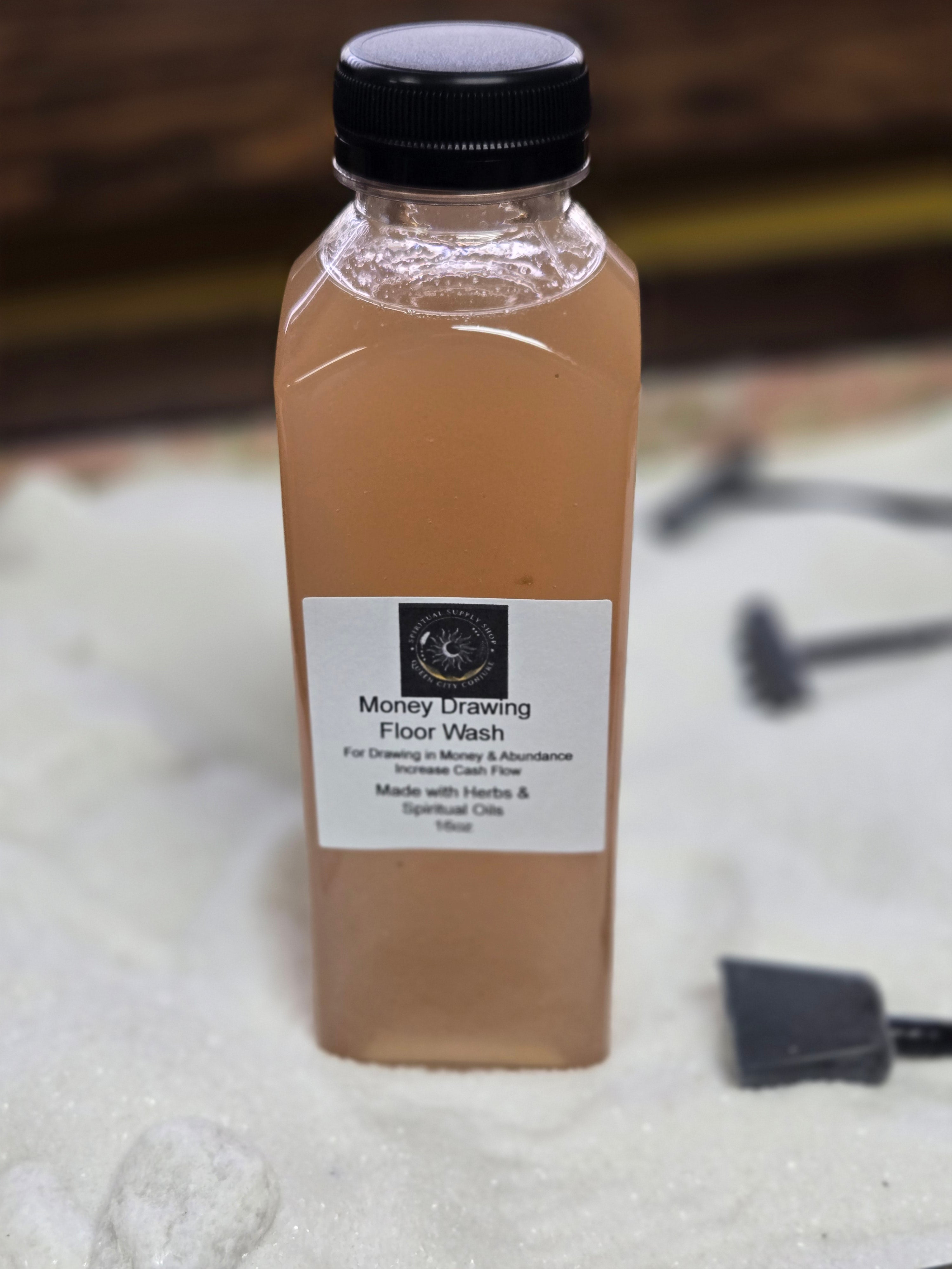 Money Drawing Floor Wash bottle with natural herbs for prosperity and success
