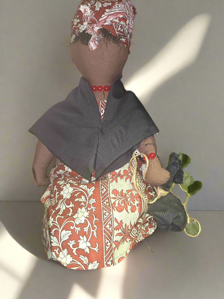 Ancestor Spirit Doll with intricate design and spiritual significance.