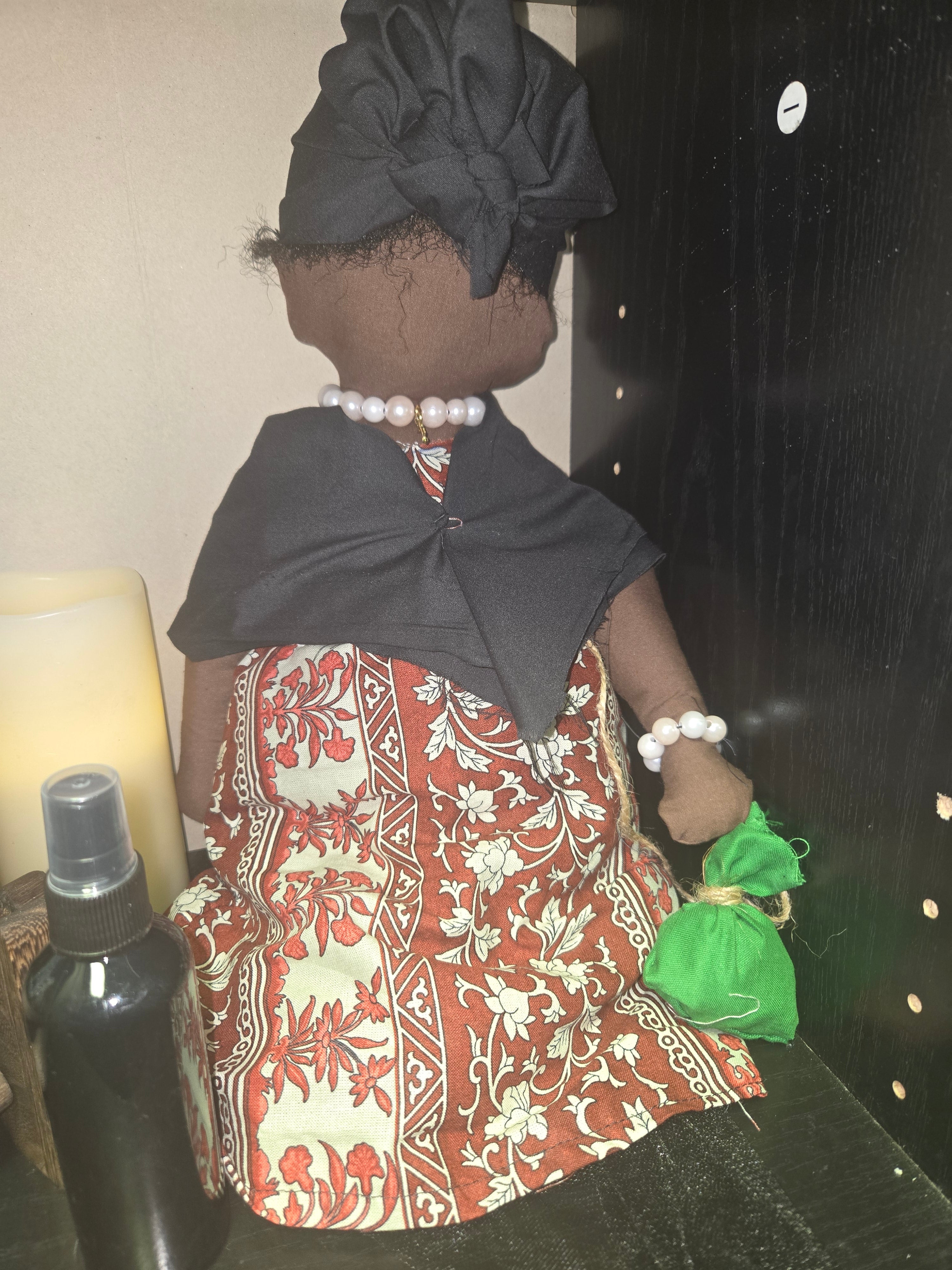 Ancestor Spirit Doll with patterned dress and headscarf, enhancing spiritual connection to ancestors.
